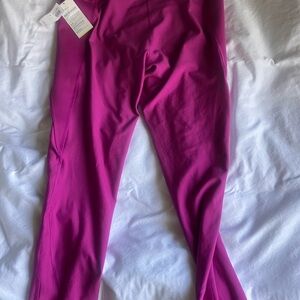 High waisted power sculpt leggings .